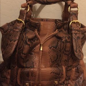 Overly large purse or overnight bag